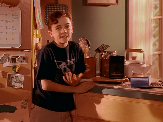 File:Malcolm asiding us.png