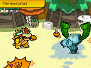 Blooperstatua fuera de Bowser.png