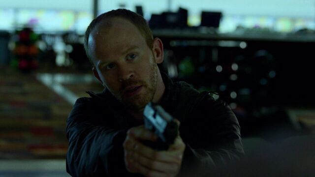File:John-Healy-aims-gun.jpg