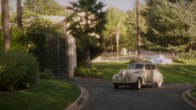 File:Peggy pulls up to the Stark Estate (2x08).png