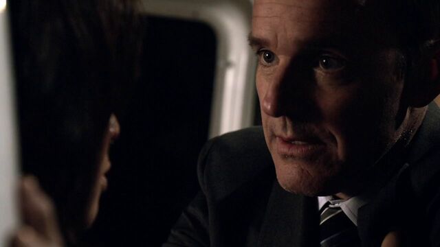 File:Phil-Coulson-comforts-Melinda-May-Bahrain.jpg