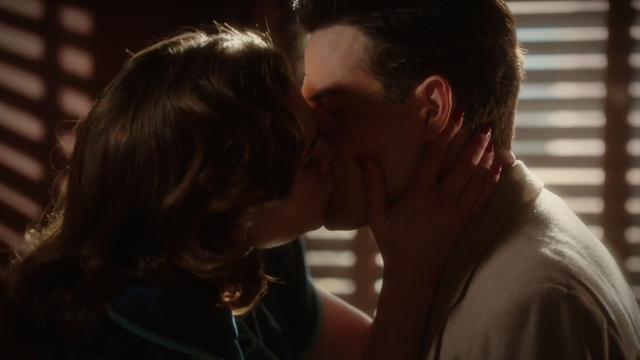 File:Peggy kisses Daniel.png
