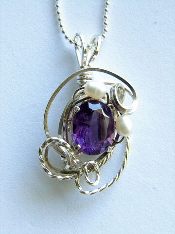 File:NithyaAmulet.jpg