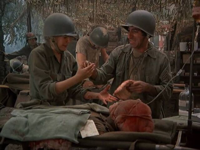 File:Margaret and Klinger-aid station.jpg