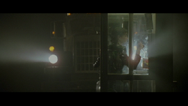 Telephone booth escape