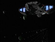 USS Defiant deploying mines.jpg