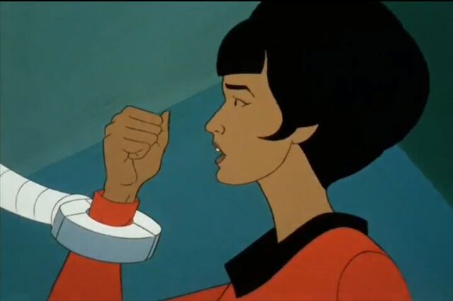 File:Uhura held hostage by the Shore Leave's Planet's master computer.jpg