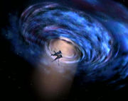 Akorem's lightship exits wormhole.jpg