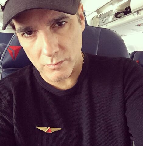 File:Yul Vazquez on plane.jpg