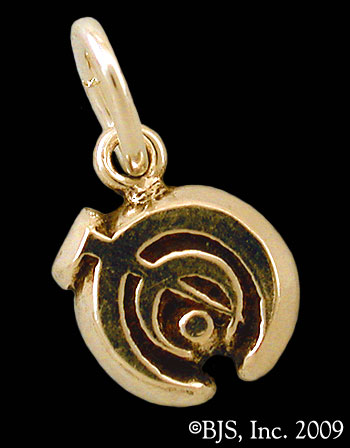 File:Tin Charm.jpg