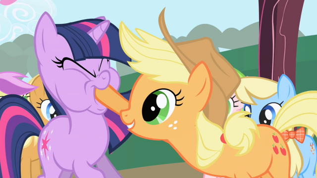 File:Applejack forcing Twilight to taste an apple S01E01.png