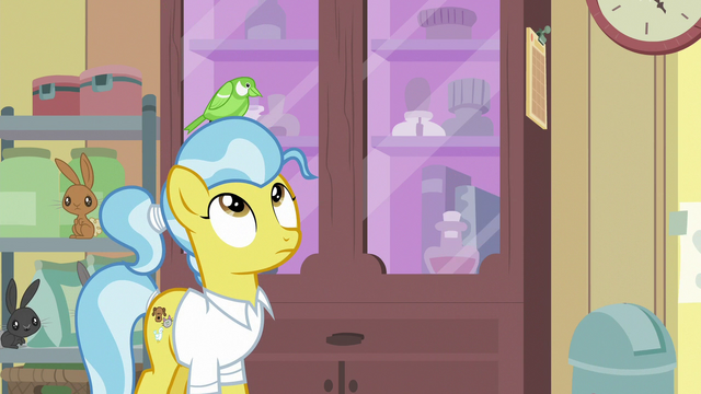 File:Green bird perches in Dr. Fauna's mane again S7E5.png