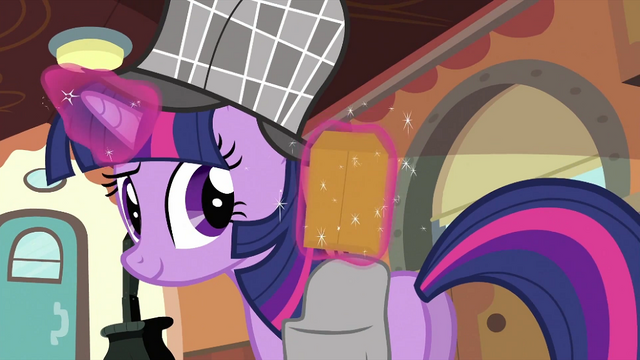 File:Twilight retrieving envelope from saddlebag S2E24.png