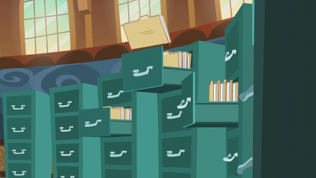 File:Files being thrown into drawers S5E19.png