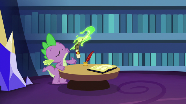 File:Spike blows magic fire on his scroll S6E15.png