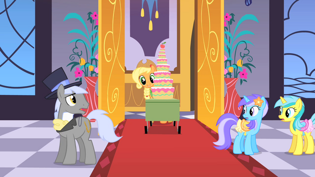 File:Applejack bringing apple cake into hall S1E26.png