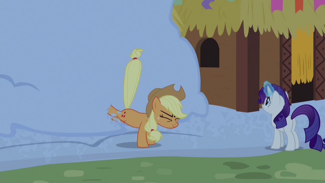 File:Applejack bucking a snow-covered yak hut S7E11.png