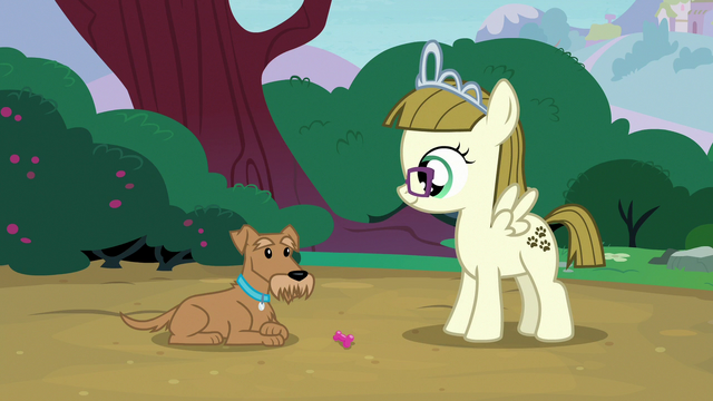 File:Ripley looking at his squeak toy S7E6.png