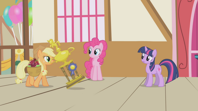 File:Applejack takes the trophy home S1E04.png