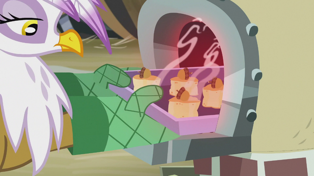 File:Gilda pulling scones out of the oven S5E8.png