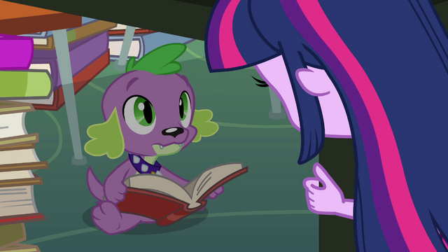 File:Spike reading a book under a table EG.png