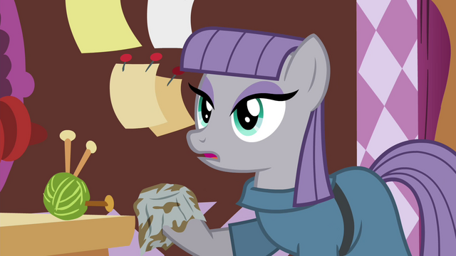 File:Maud holding a dishtowel S4E18.png