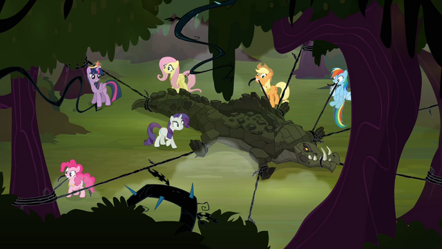 File:Cragadile being restrained S4E02.png