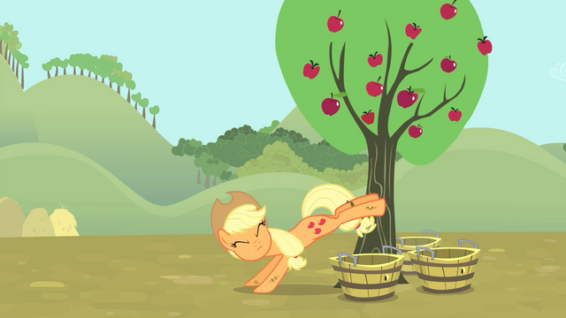 File:Applejack bucking apples S4E13.png