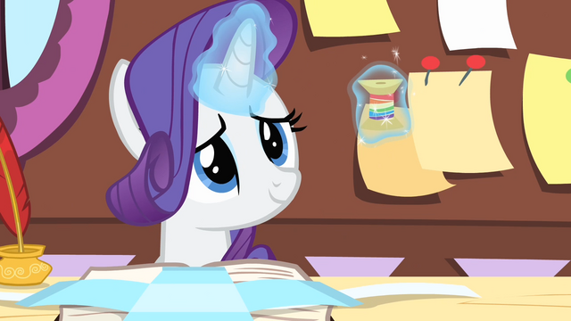 File:Rarity smiling while levitating the thread S4E08.png