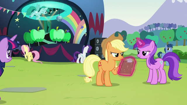 File:Applejack checking clipboard S5E24.png