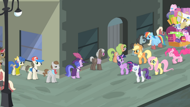 File:Main cast walking beside a line of ponies S4E08.png