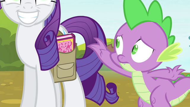 File:Spike reaches for the spell book S4E23.png