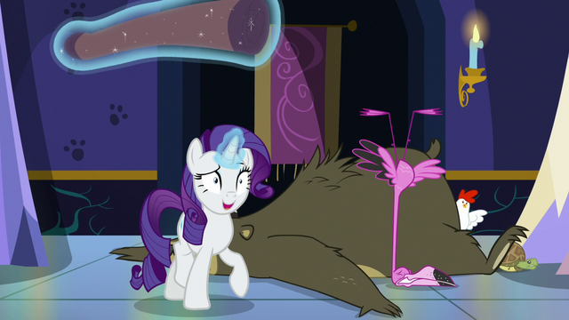 File:Rarity walks away with rolled-up carpet S6E21.png