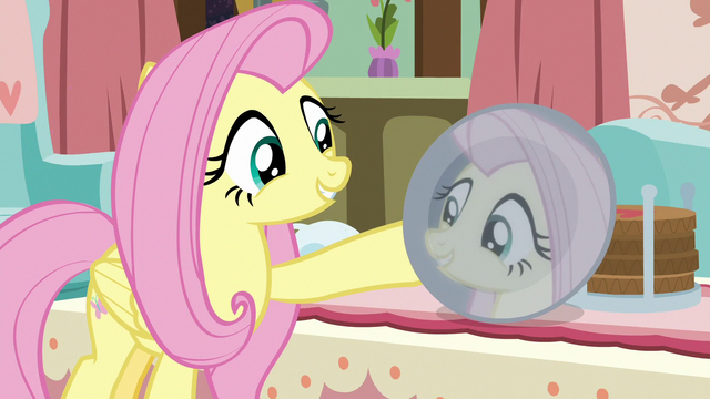 File:Fluttershy looking at her reflection S7E12.png