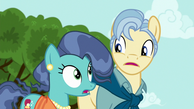 File:Petunia's parents look at each other S6E19.png