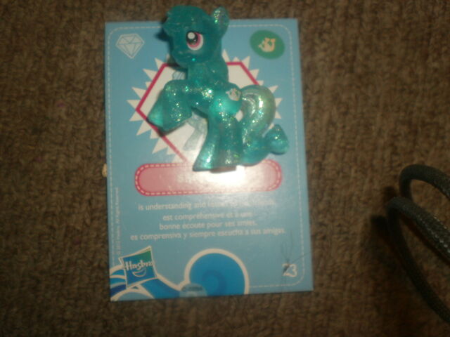File:Shoeshine collectable toy with info card.jpg