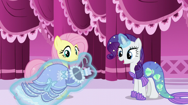 File:Rarity levitates period costume in front of Fluttershy S5E21.png