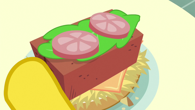 File:Brick in Mr. Cake's hay burger S6E15.png