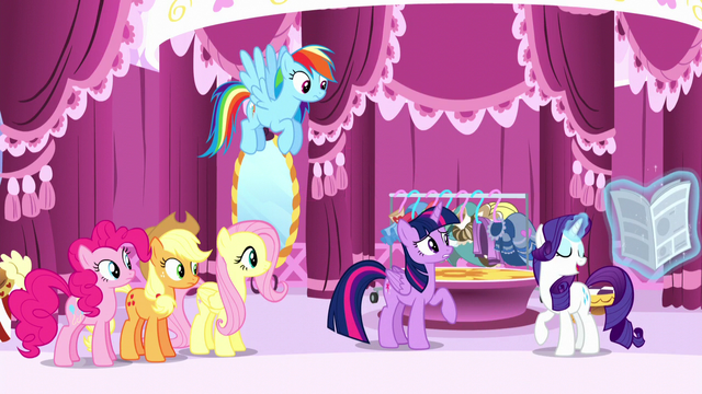 File:Rarity levitates the newspaper back to her S6E9.png