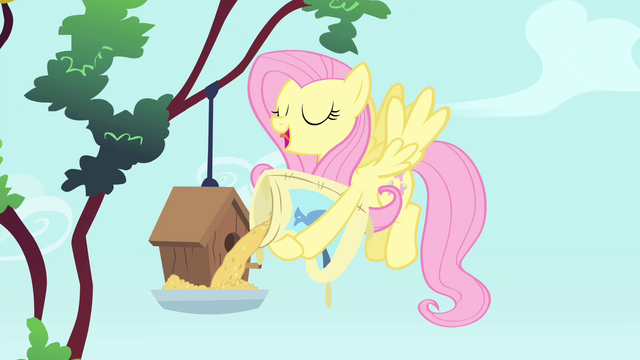 File:Fluttershy pouring birdseed S4E23.png