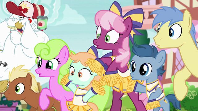 File:Cheerleaders and spectators looking worried S6E14.png