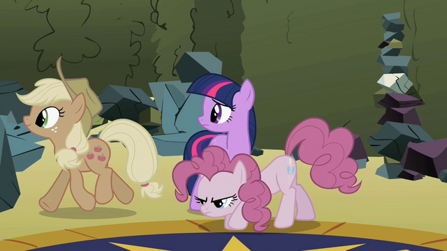 File:Applejack and Pinkie walking away S2E01.png