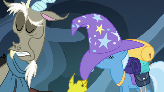 File:Discord pulls Trixie's hat down over her eyes S6E25.png