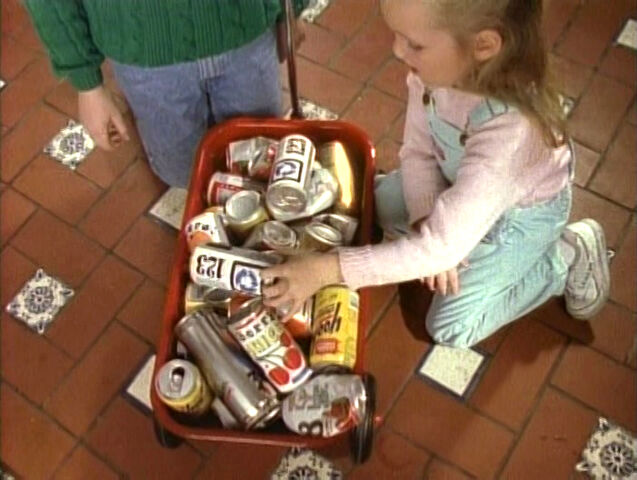 File:Girl-recycles-cans.jpg