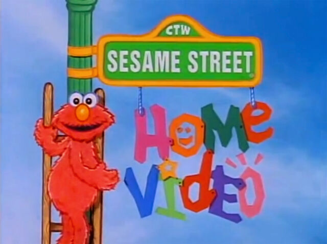 File:SesameHomeVideo-Elmo.jpg