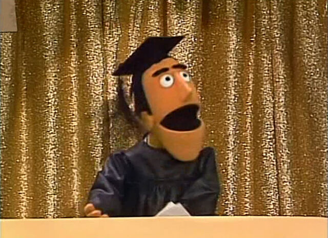 File:GuySmiley-Cap&Gown.jpg