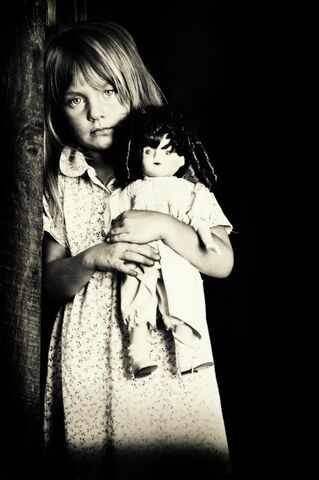 File:Ist2 8883747-portrait-of-little-girl-holding-doll-black-and-white.jpg