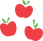 Trois pommes rouges.