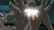 Gyuki e Naruto socam o Gedo Mazo.png