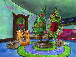 CatDog admiring their tree